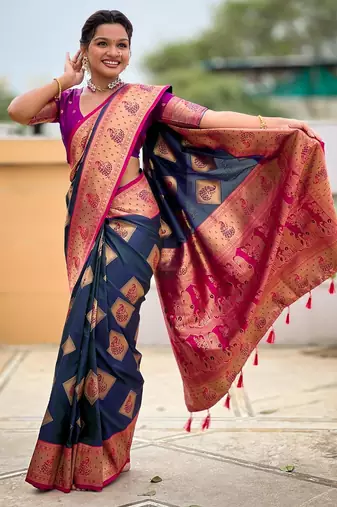 Teal elegant art silk woven saree with rich zari border