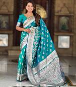 Rama green elegant art silk woven saree with rich zari border
