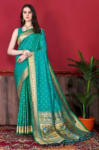 Rama green elegant art silk woven saree with rich zari border