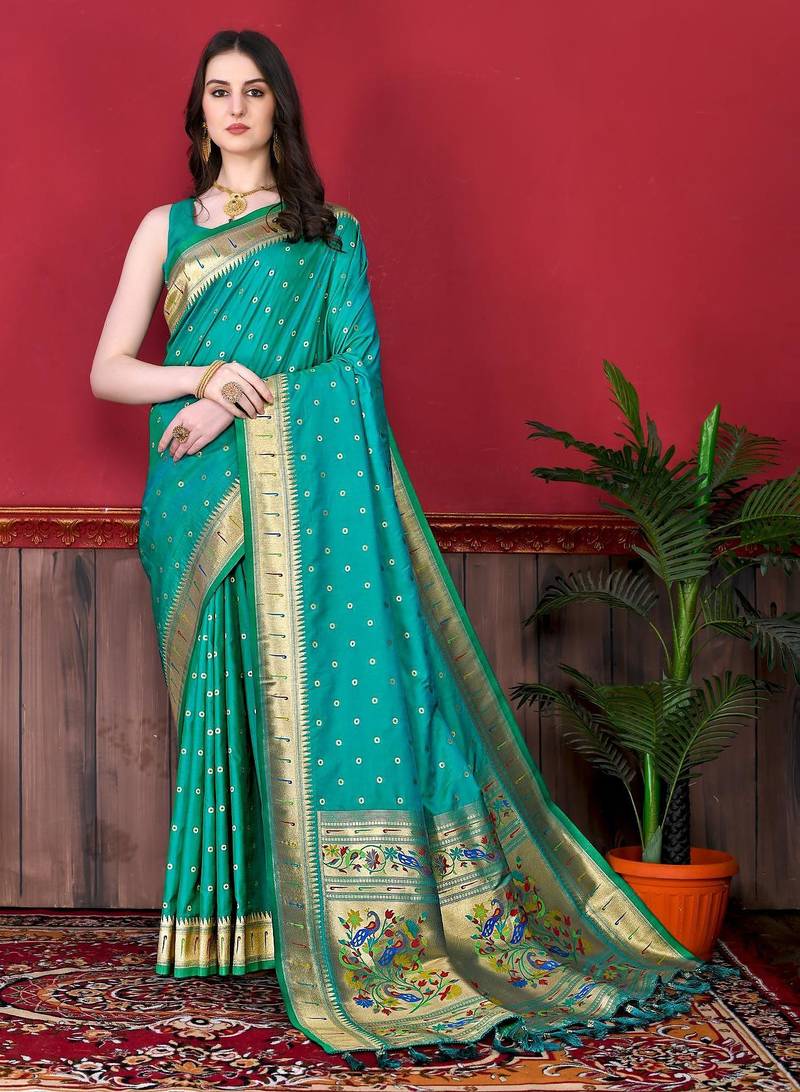 Rama green elegant art silk woven saree with rich zari border