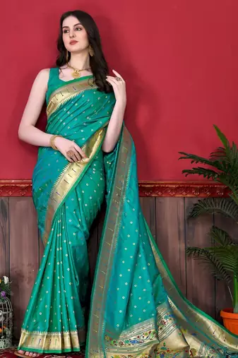 Rama green elegant art silk woven saree with rich zari border