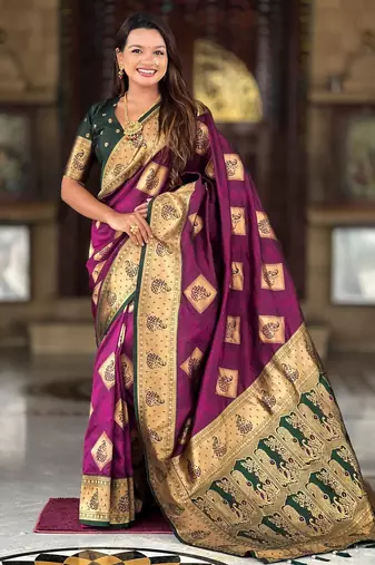 Wine elegant art silk woven saree with rich zari border