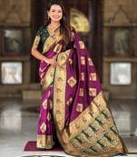 Wine elegant art silk woven saree with rich zari border
