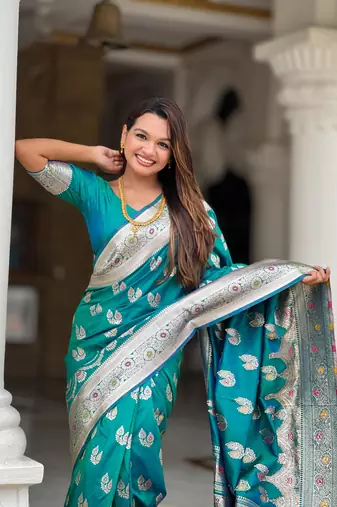 Rama green elegant art silk woven saree with rich zari border