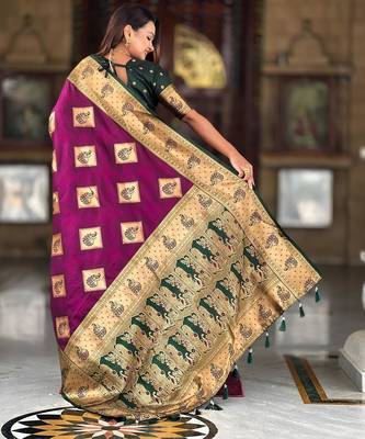 Wine elegant art silk woven saree with rich zari border 2