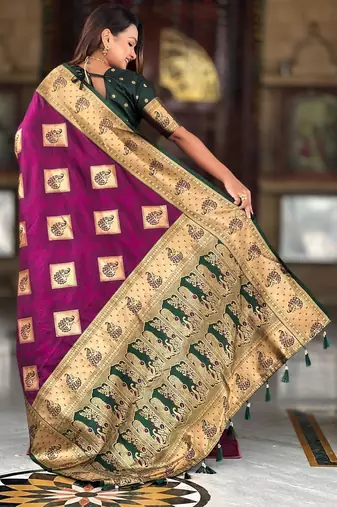 Wine elegant art silk woven saree with rich zari border
