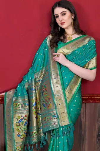Rama green elegant art silk woven saree with rich zari border