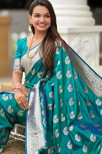 Rama green elegant art silk woven saree with rich zari border