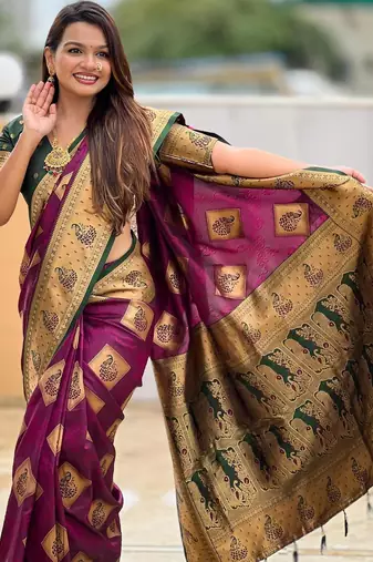 Wine elegant art silk woven saree with rich zari border
