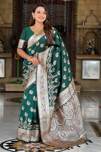 Green elegant art silk woven saree with rich zari border