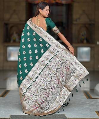 Green elegant art silk woven saree with rich zari border 2