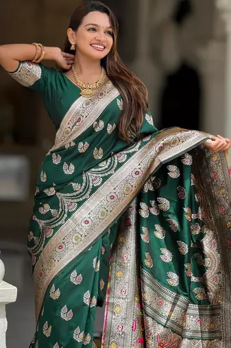 Green elegant art silk woven saree with rich zari border