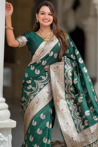 Green elegant art silk woven saree with rich zari border