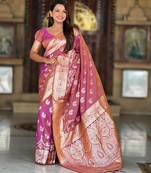 Pink elegant art silk woven saree with rich zari border