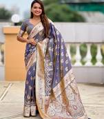Grey elegant art silk woven saree with rich zari border