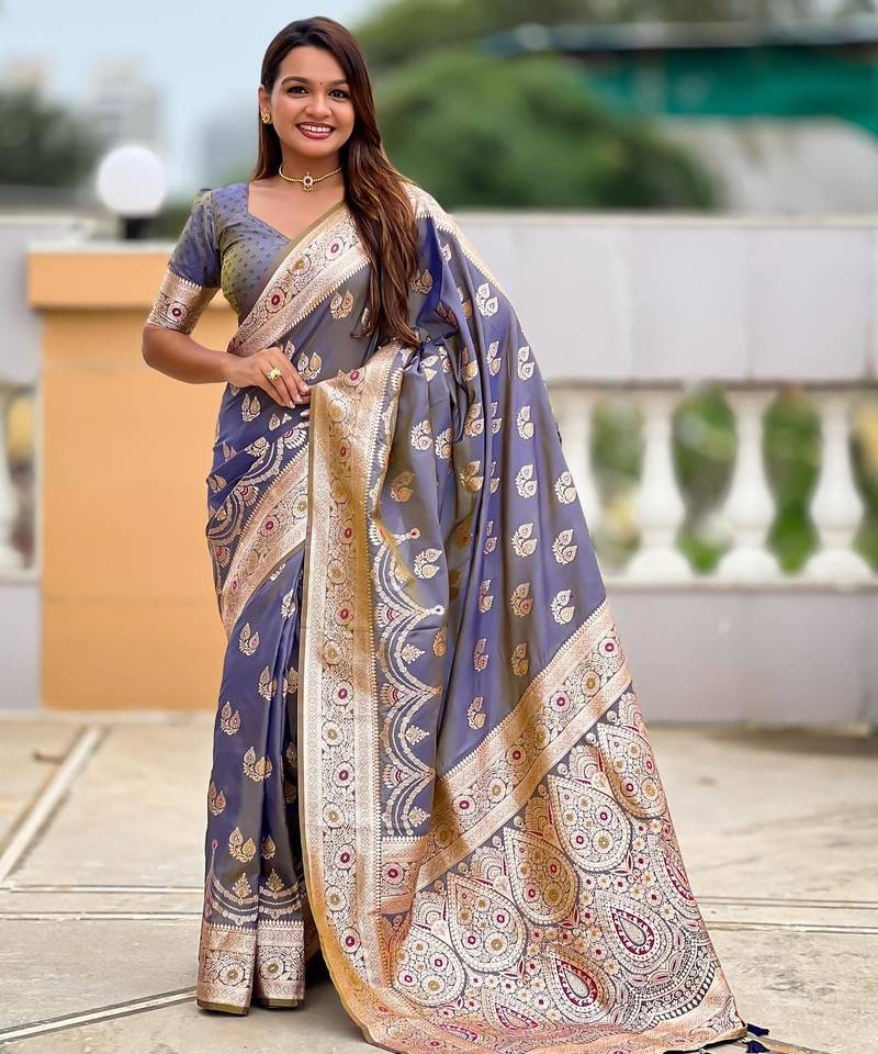 Grey elegant art silk woven saree with rich zari border