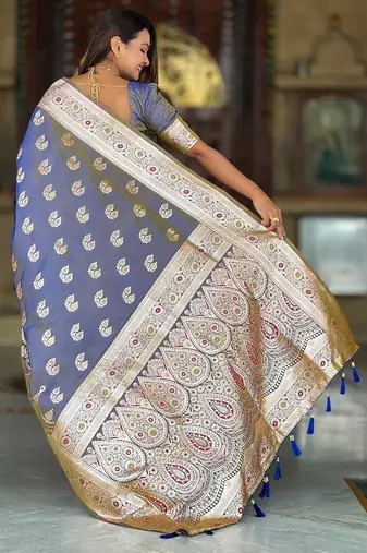 Grey elegant art silk woven saree with rich zari border
