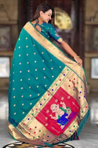 Rama green elegant art silk woven saree with rich zari border