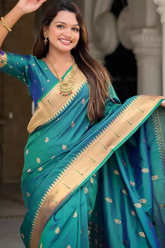 Rama green elegant art silk woven saree with rich zari border
