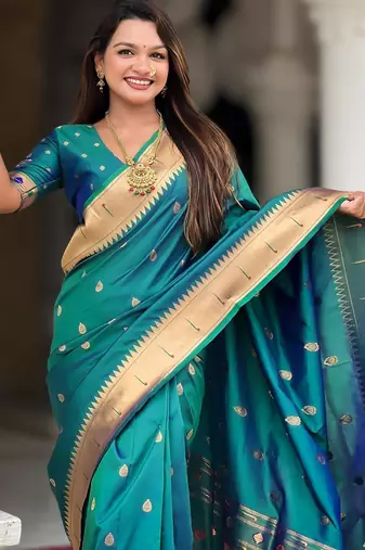 Rama green elegant art silk woven saree with rich zari border