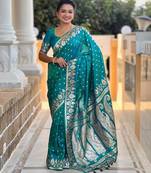 Rama green elegant art silk woven saree with rich zari border