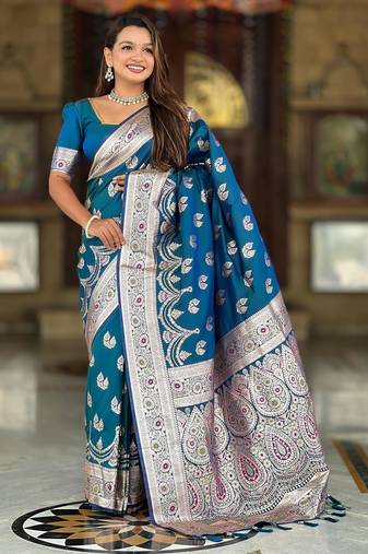 Teal elegant art silk woven saree with rich zari border