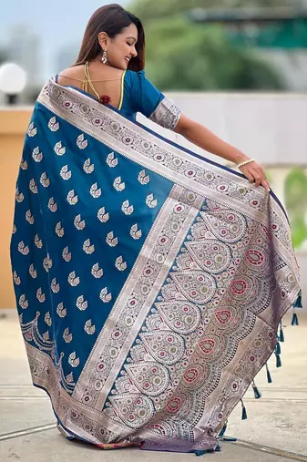 Teal elegant art silk woven saree with rich zari border