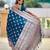 Teal elegant art silk woven saree with rich zari border