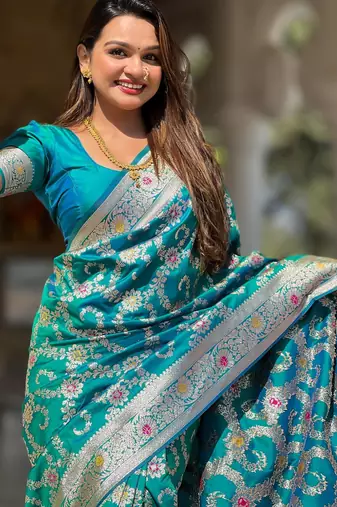 Rama green elegant art silk woven saree with rich zari border