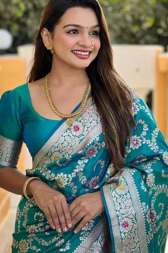 Rama green elegant art silk woven saree with rich zari border
