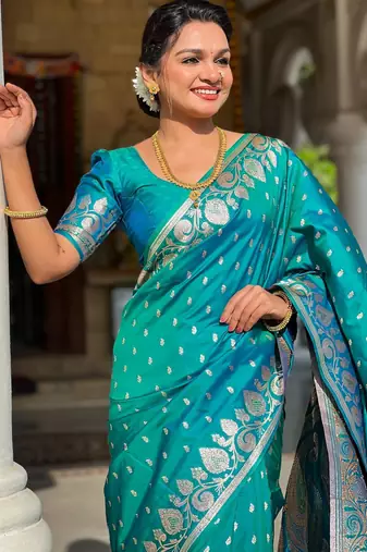 Rama green elegant art silk woven saree with rich zari border