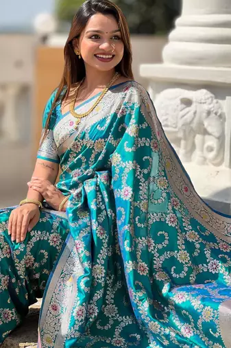 Rama green elegant art silk woven saree with rich zari border