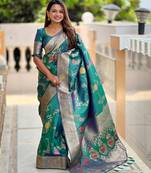 Rama green elegant art silk woven saree with rich zari border