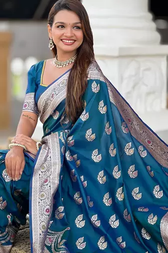 Teal elegant art silk woven saree with rich zari border