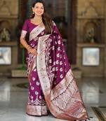 Wine elegant art silk woven saree with rich zari border