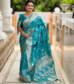 Rama green elegant art silk woven saree with rich zari border