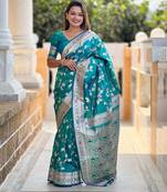 Rama green elegant art silk woven saree with rich zari border