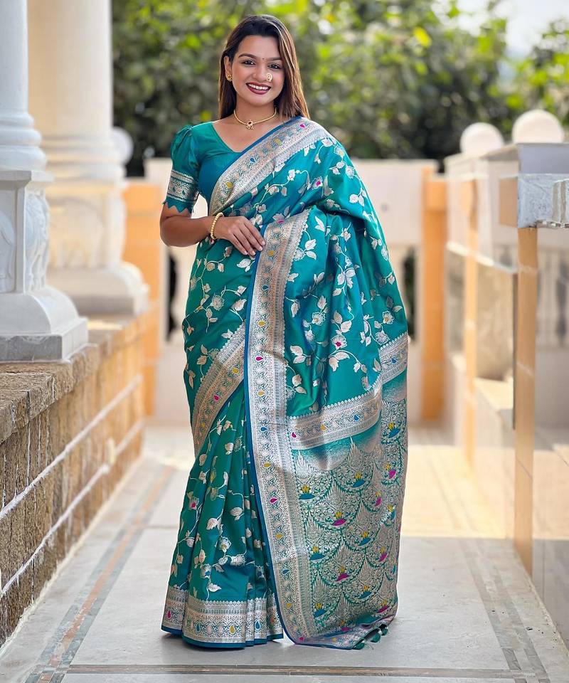 Rama green elegant art silk woven saree with rich zari border