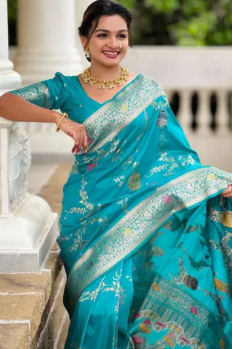 Rama green elegant art silk woven saree with rich zari border