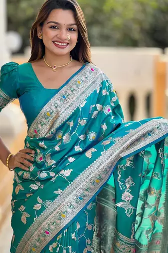 Rama green elegant art silk woven saree with rich zari border