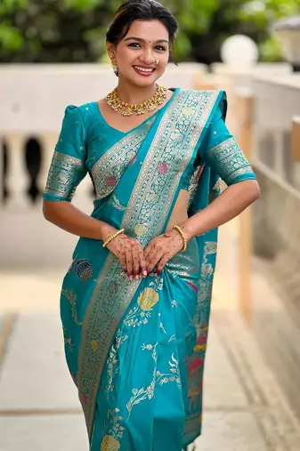 Rama green elegant art silk woven saree with rich zari border