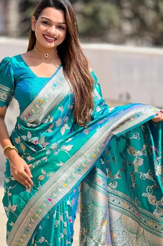 Rama green elegant art silk woven saree with rich zari border