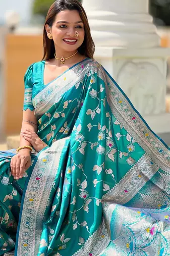 Rama green elegant art silk woven saree with rich zari border