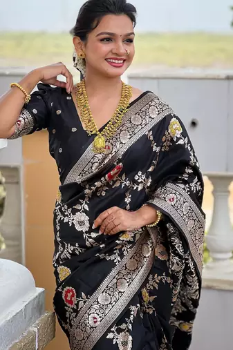 Black elegant art silk woven saree with rich zari border