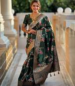 Green elegant art silk woven saree with rich zari border