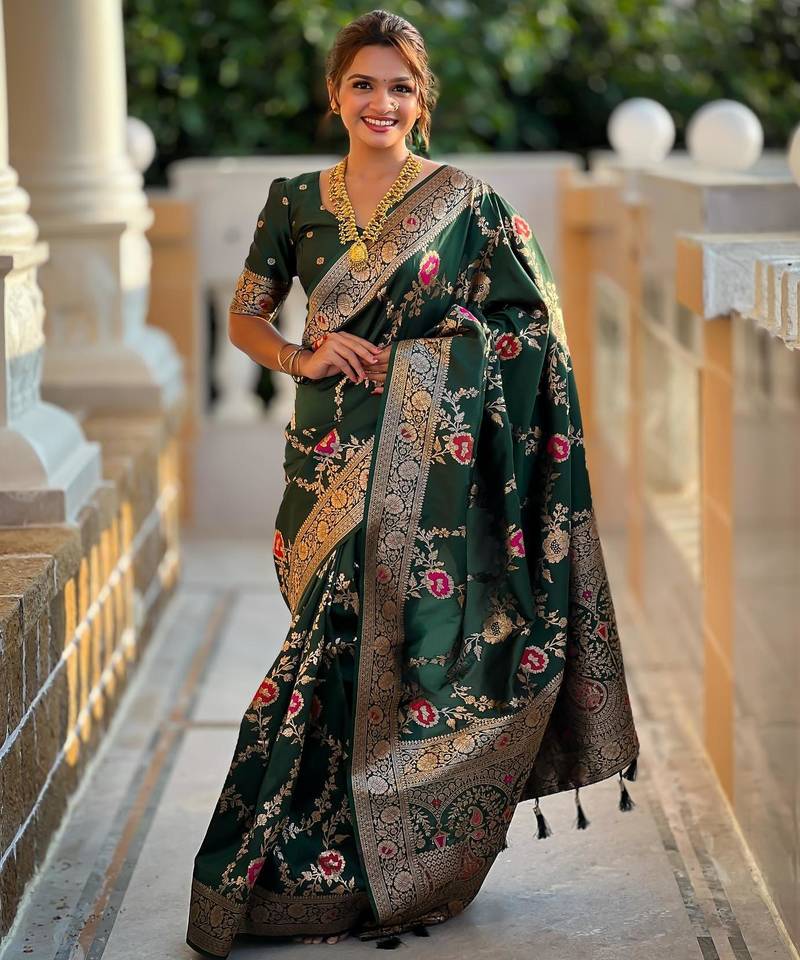 Green elegant art silk woven saree with rich zari border