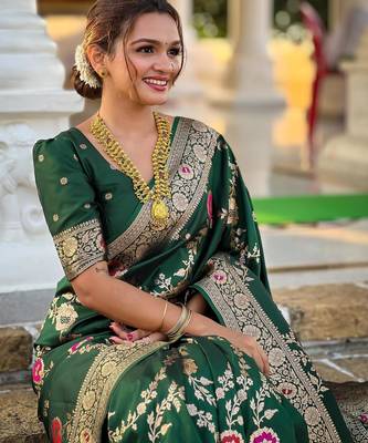 Green elegant art silk woven saree with rich zari border 4