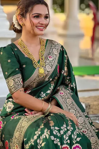 Green elegant art silk woven saree with rich zari border