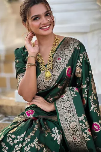 Green elegant art silk woven saree with rich zari border