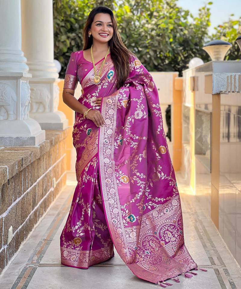 Onion pink elegant art silk woven saree with rich zari border